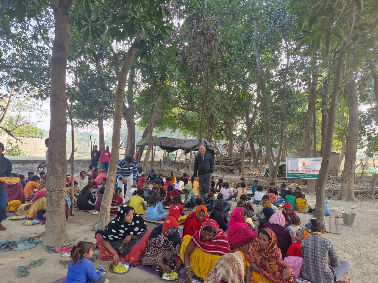 Volunteers distributing warm meals to people